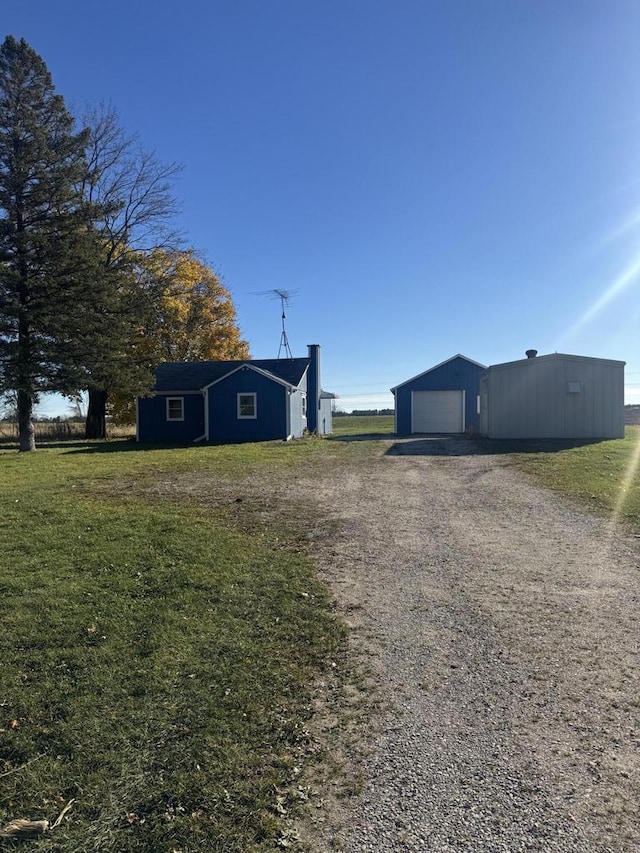 view of yard with a garage