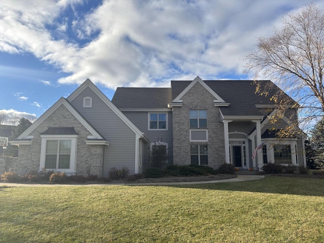 view of front of home featuring a front lawn