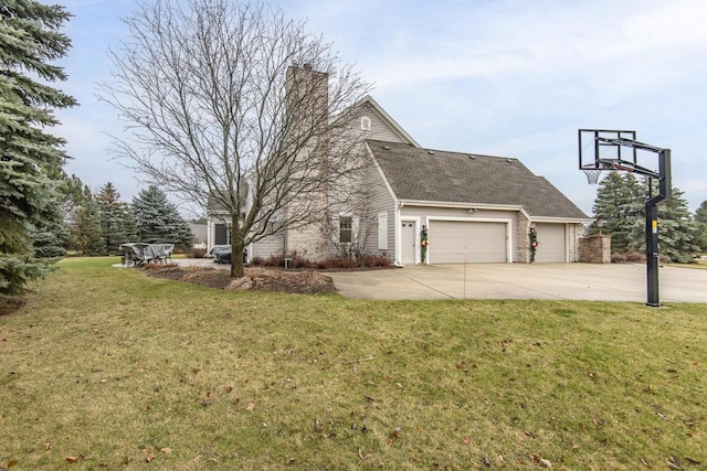 view of property exterior with a garage and a yard