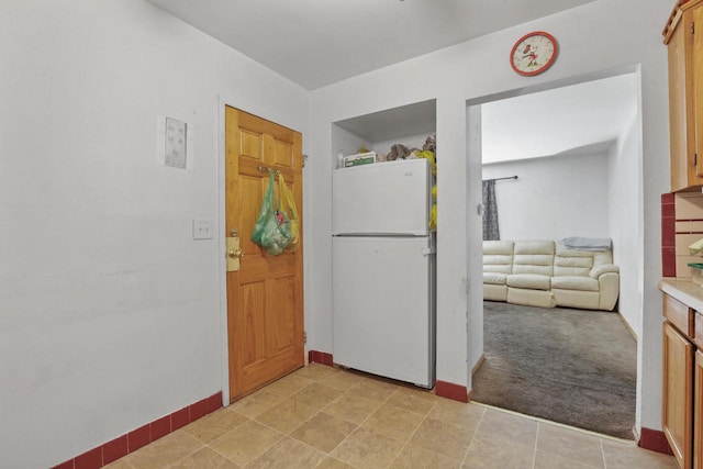 view of carpeted entryway