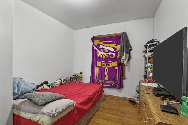 bedroom featuring hardwood / wood-style flooring