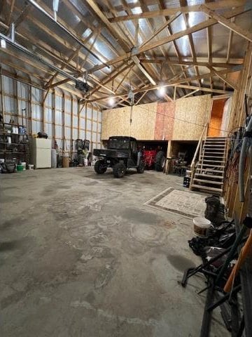 garage featuring washer / clothes dryer and a garage door opener