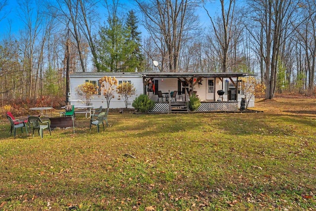 exterior space with a yard and a porch