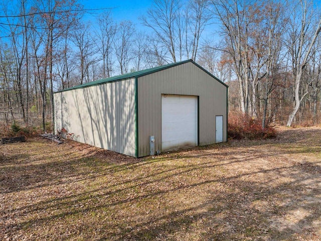 view of outbuilding with a garage