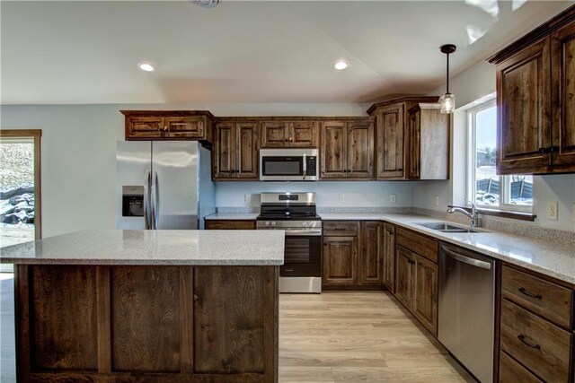 1805 11th Ave Lot 19, Menomonie, WI 54751 - kitchen featuring stainless steel appliances, a sink, plenty of natural light, light wood-type flooring, and recessed lighting