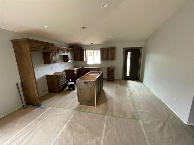 1805 11th Ave Lot 19, Menomonie, WI 54751 - kitchen featuring a center island, baseboards, recessed lighting, and hanging light fixtures