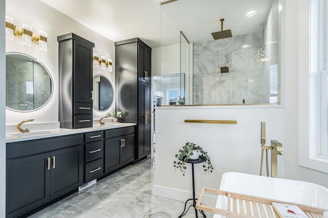 bathroom with independent shower and bath and vanity