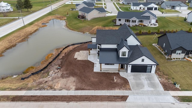 bird's eye view with a water view