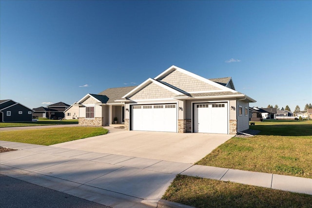 craftsman-style home with a front lawn and a garage