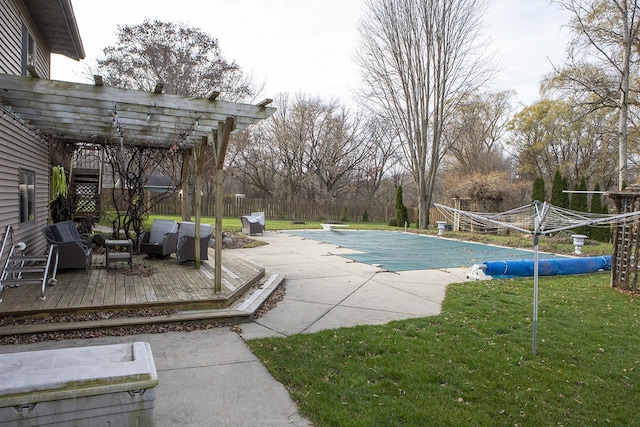 view of swimming pool with a pergola, a deck, an outdoor living space, a diving board, and a lawn