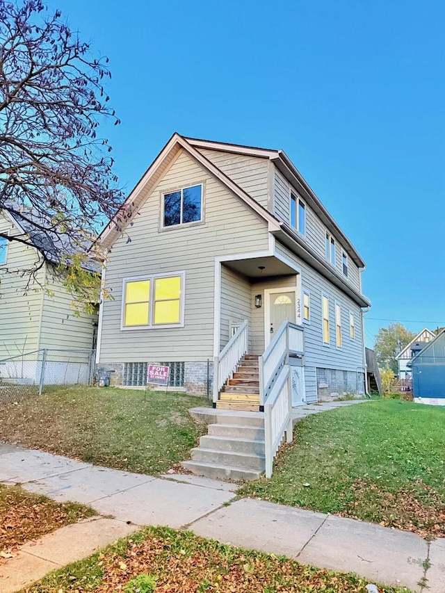 view of front of house with a front yard