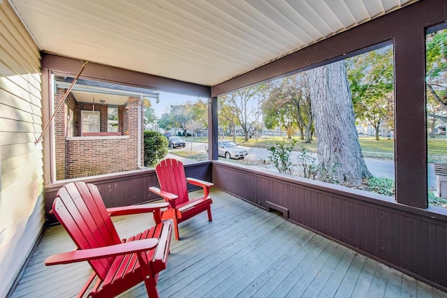 sunroom / solarium with a healthy amount of sunlight