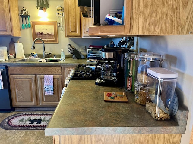 kitchen featuring black dishwasher and sink