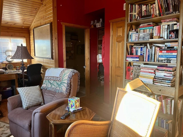 sitting room featuring lofted ceiling and wooden ceiling