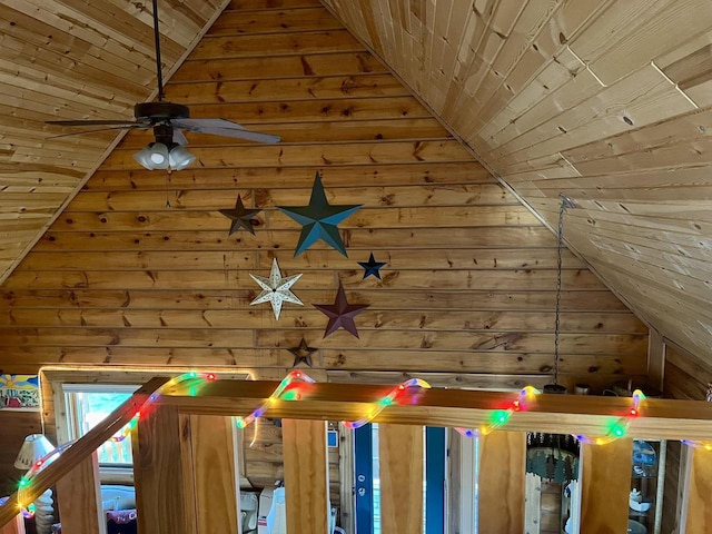 exterior details with wood ceiling, wooden walls, and ceiling fan