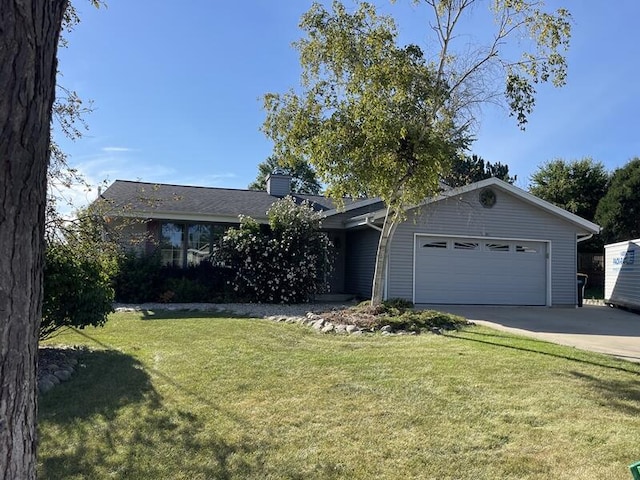 ranch-style house with a front yard and a garage