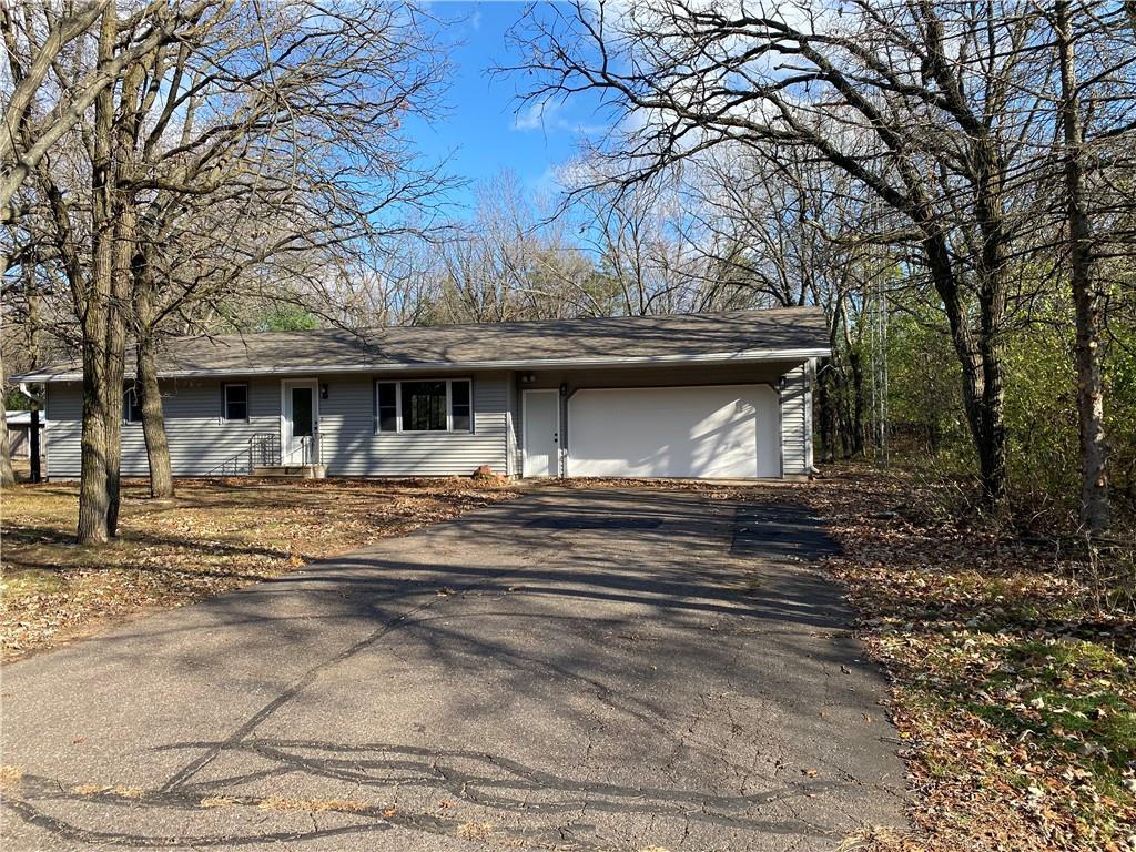 single story home with a garage