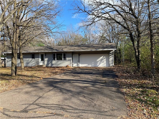 single story home with a garage