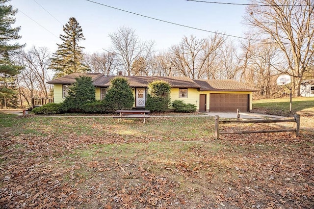 single story home with a garage