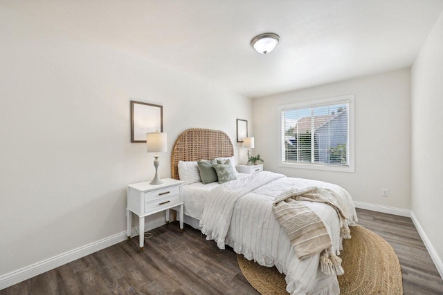 bedroom featuring dark hardwood / wood-style floors