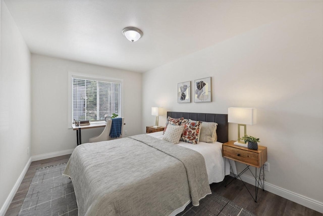 bedroom featuring dark hardwood / wood-style floors