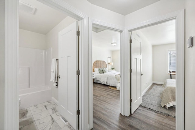 bathroom featuring wood-type flooring