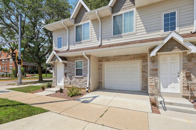 view of front of property with a garage