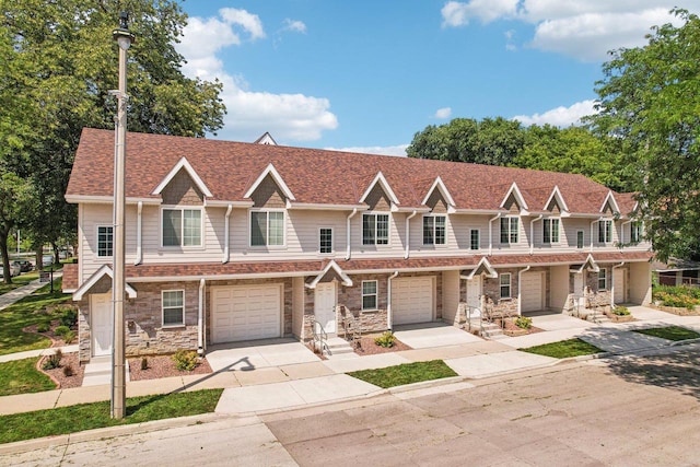 craftsman house with a garage