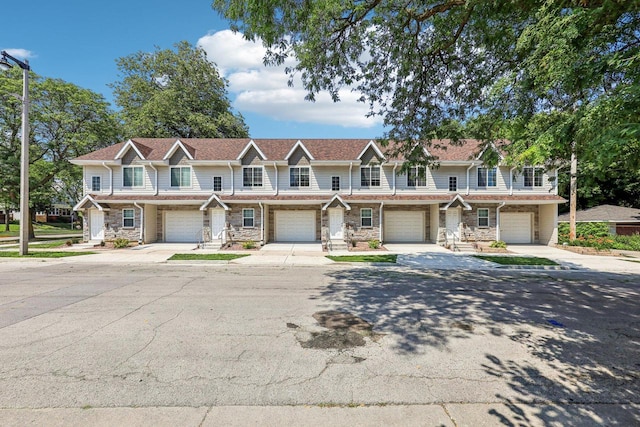 view of front of property with a garage