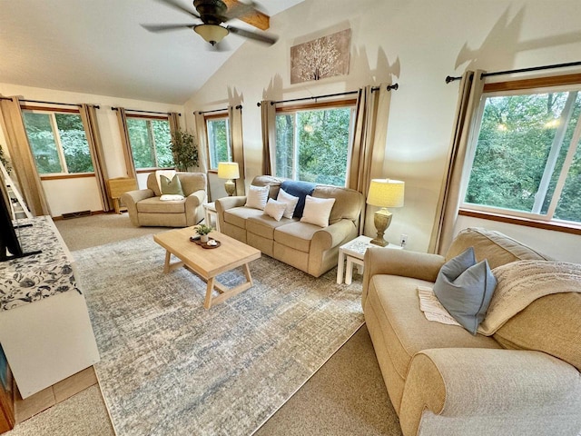 living room featuring carpet floors, lofted ceiling, and ceiling fan