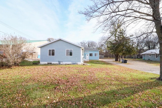 exterior space featuring a front lawn