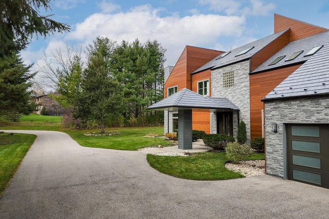 view of property exterior with a yard