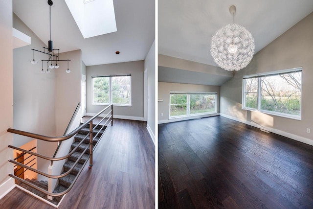 interior space featuring an inviting chandelier, dark wood-type flooring, and vaulted ceiling with skylight