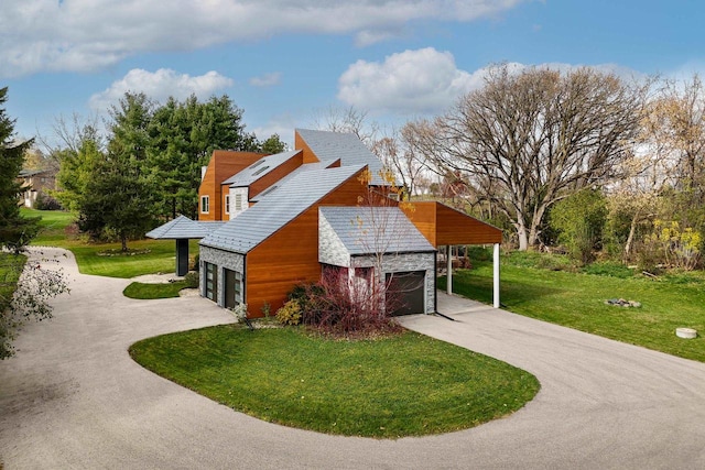 view of side of home with a lawn