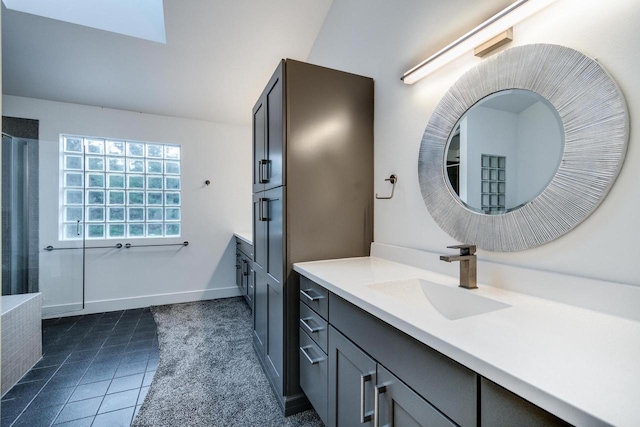 bathroom with vanity and tile patterned floors