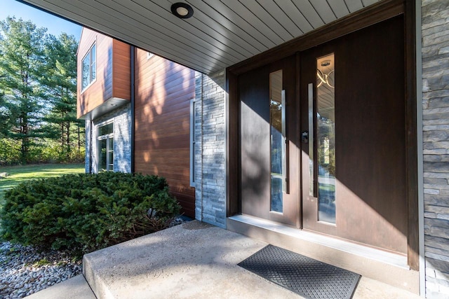 4720 Sumac Rd, Middleton, WI 53562 - view of exterior entry featuring a porch and stone siding