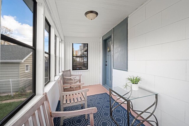 sunroom / solarium featuring a wealth of natural light