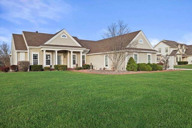 view of front of home with a front yard