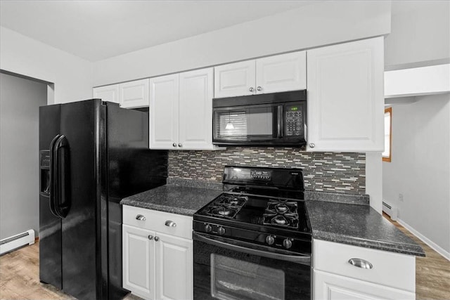 kitchen with white cabinets, backsplash, light hardwood / wood-style flooring, and black appliances