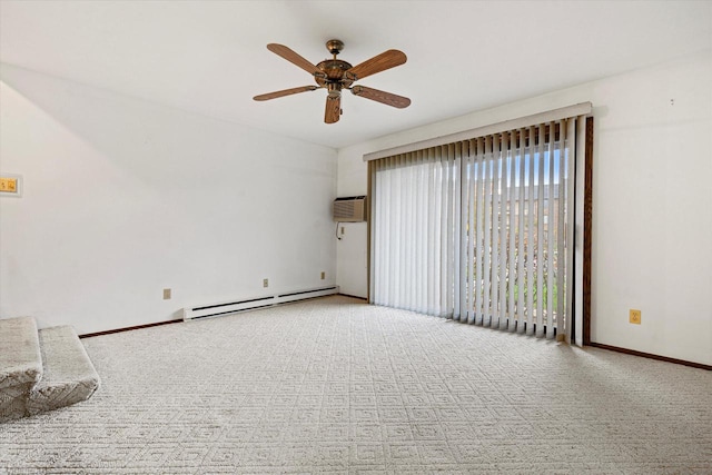 spare room featuring baseboard heating, a wall mounted AC, ceiling fan, and carpet