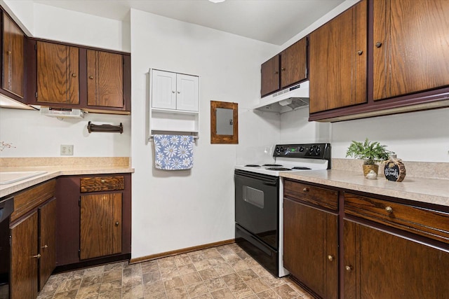 kitchen featuring black appliances, dark brown cabinetry, and sink