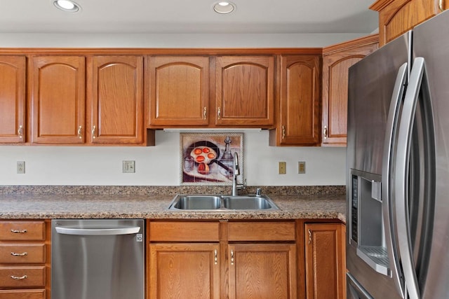 kitchen featuring appliances with stainless steel finishes and sink