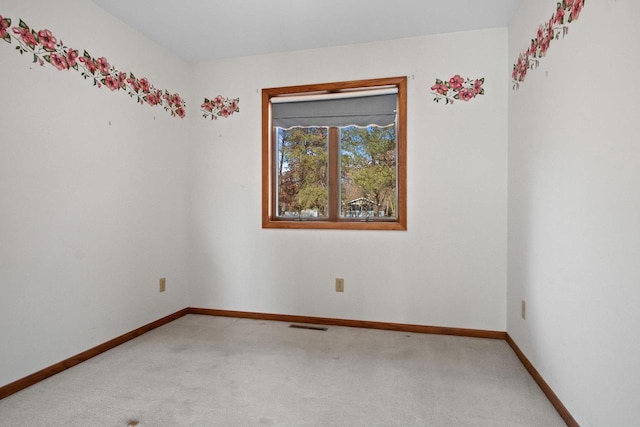 view of carpeted spare room