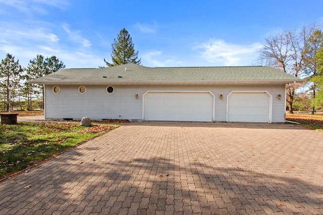 view of property exterior featuring a garage