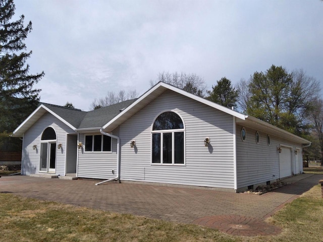 361 Yeoman Ct, Nekoosa, WI 54457 - back of house with an attached garage