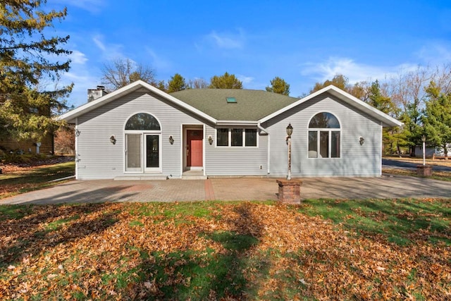 ranch-style home with a patio area