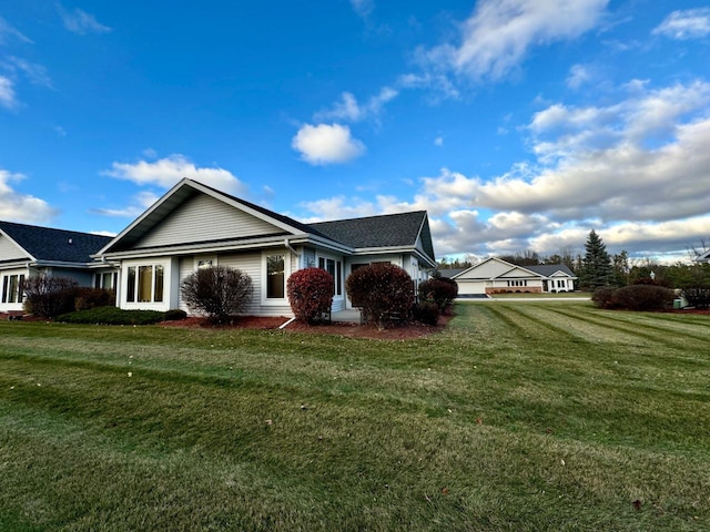 view of property exterior featuring a yard