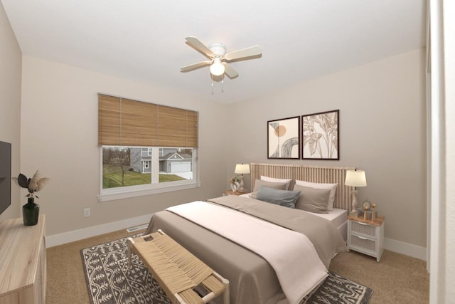 bedroom featuring ceiling fan and light colored carpet