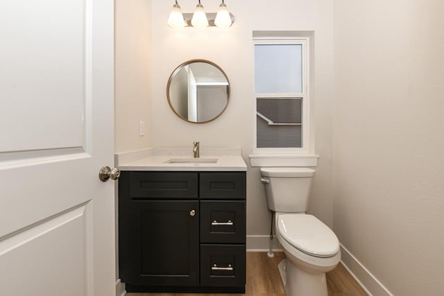 1411 Tamarack St, Delavan, WI 53115 - bathroom with vanity and wood finished floors