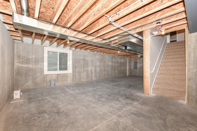 1411 Tamarack St, Delavan, WI 53115 - below grade area featuring stairway and electric panel